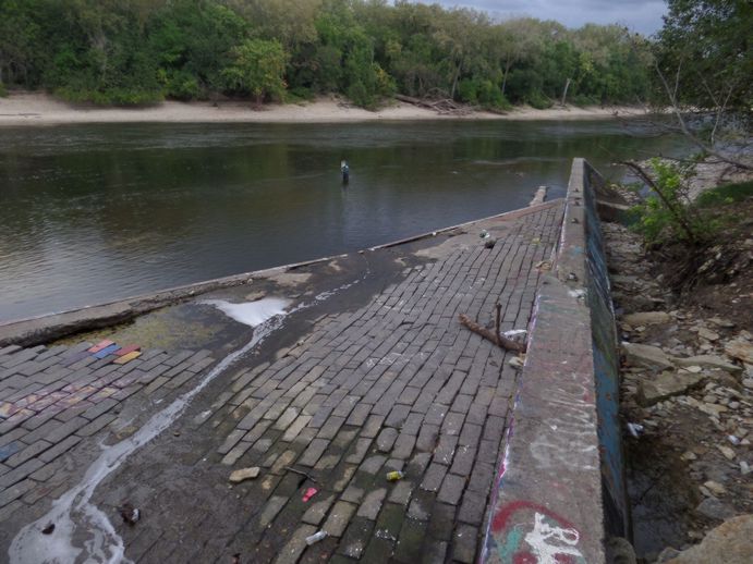 Weird brick structure next to a river.