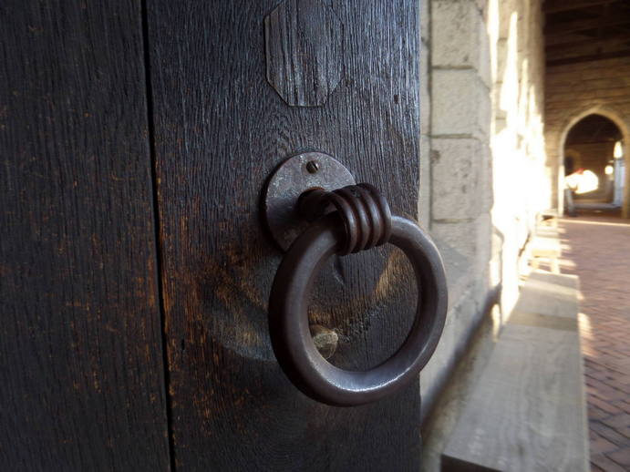 a thick ring of a door knocker.