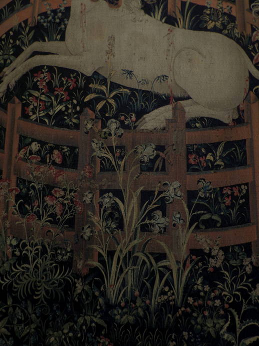 detail of the tapestry showing the gate of the enclosure.