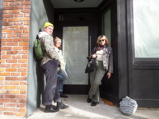 three people looking extremely cool in a sunny nook