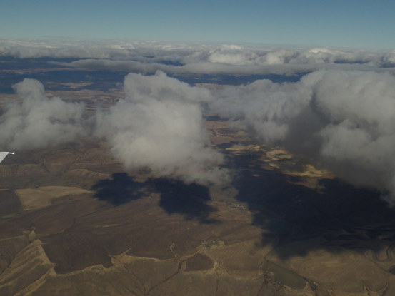 rolling hills out an airplane window