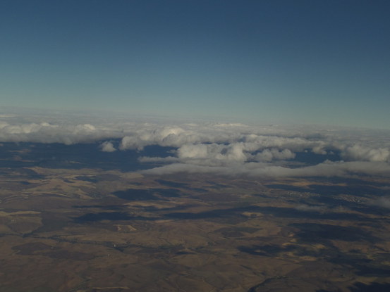 rolling hills out an airplane window, further